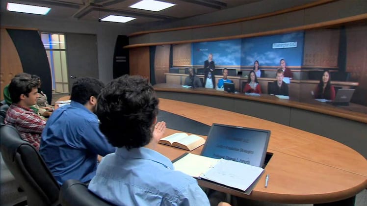 Immersive telepresence video conference with life-size displays.
